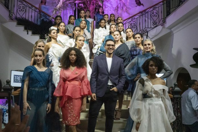 Jose Cristian junto a las modelos